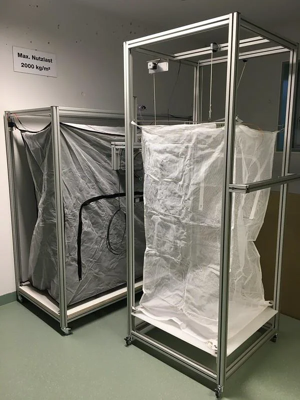 The dark cage and the breeding cage in the Eawag nursery, connected for a filling run