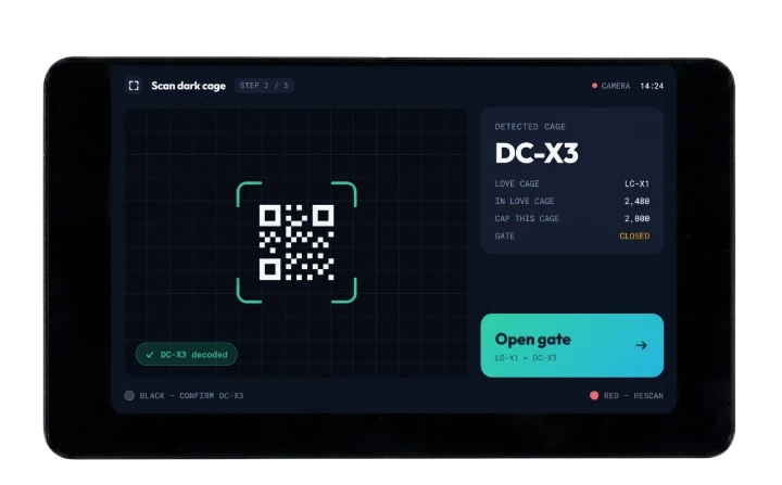 The scan screen, reading the code on a dark cage and showing its details before the gate is opened
